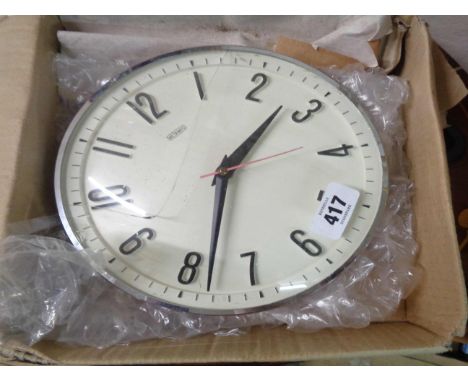 A vintage Metamec wall timepiece with electric movement - sold as a collector's item only (plastic dial a/f)