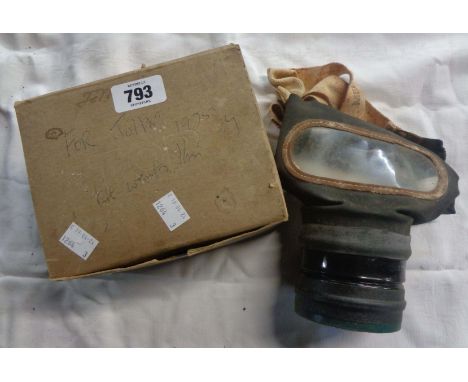A boxed vintage gas mask
