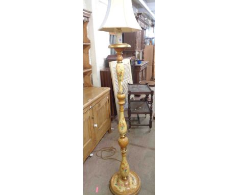 A vintage Italian painted wood standard lamp with all-over floral decoration to turned pillar, set on a circular base - with 