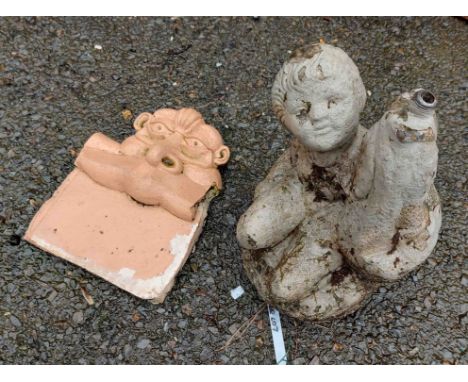 A fountain in the form of a child - sold with a gargoyle pattern planter