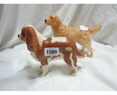 A Beswick pottery King Charles Spaniel figure - sold with a matt glazed Golden Retriever figure