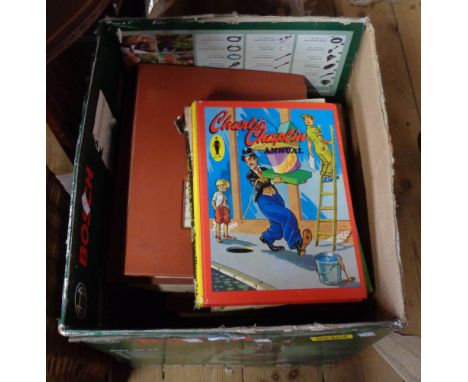 A box containing a quantity of vintage Rolls Royce manuals, etc.