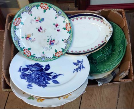 A box containing a quantity of ceramic plates including green glazed Majolica leaf plate, etc.