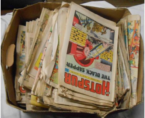A box containing a quantity of vintage comics including The Beano, The Hotspur, The Topper, etc.