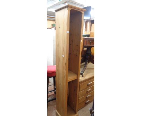 A modern freestanding narrow open CD storage unit with adjustable shelves - 1.8m high