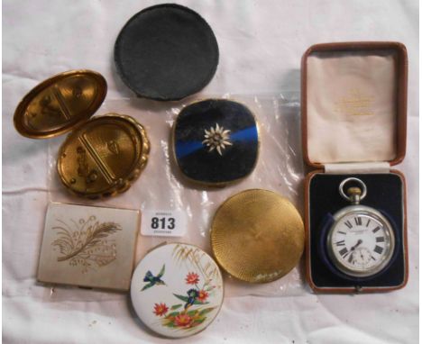 A bag containing five vintage compacts - sold with a military pocket watch
