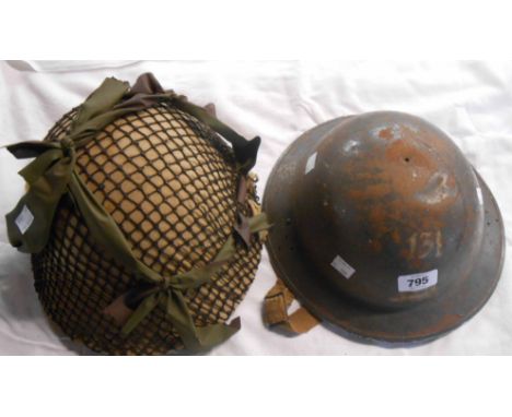 Two vintage helmets