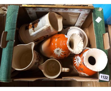 A box containing quantity of ceramics including a set of three Victorian graduated jugs, four Lladro bells, a ceramic photo f