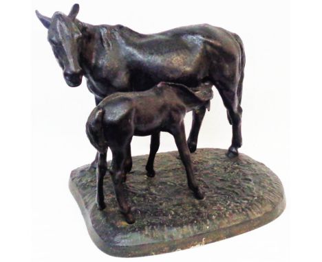 A vintage Russian black painted cast iron figurine, depicting a mare and foal - stamped to base