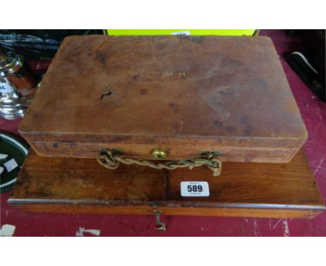 An antique Asprey leather clad jewellery case with inner trays and initials on top - for restoration - sold with a wooden lif