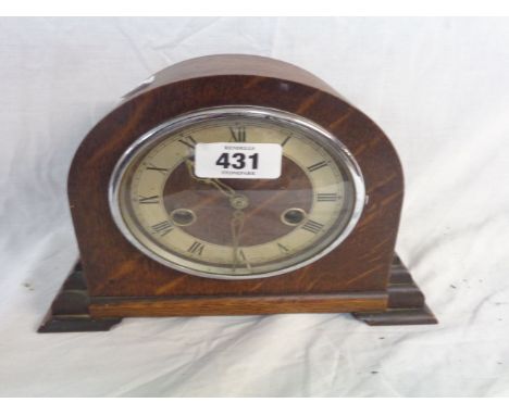 A vintage oak cased Enfield mantel clock (gong missing), with eight day movement