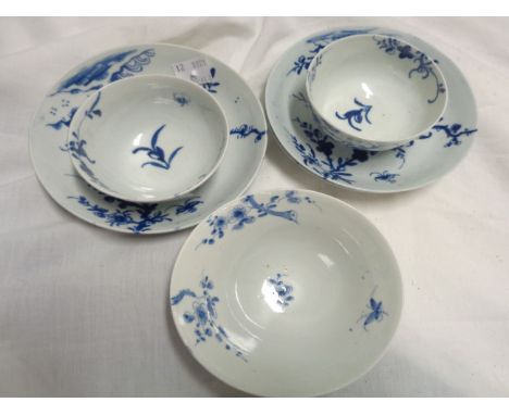 A pair of 18th Century Worcester porcelain tea bowls and saucers, with blue painted floral decoration - sold with a spare sau