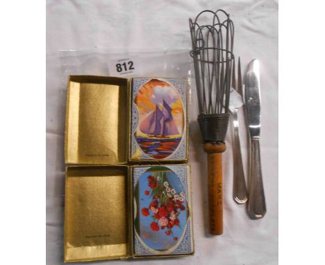 A vintage Bournville coco whisk - sold with two packs of playing cards and a Lufthansa knife and fork