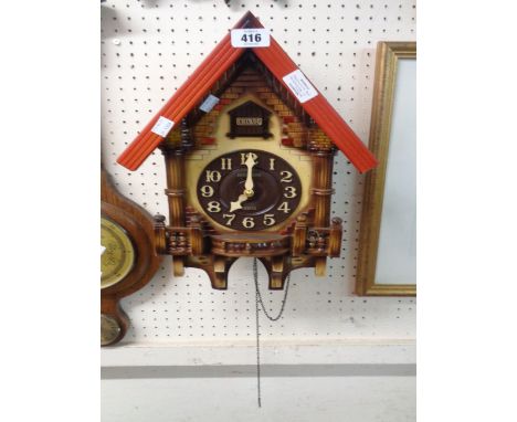 A modern Rhythm wood and plastic cased cuckoo wall clock with battery movement - a/f