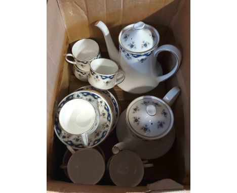 A box containing a quantity of Paragon bone china teaware decorated in the Coniston pattern including teapot, coffee pot, etc
