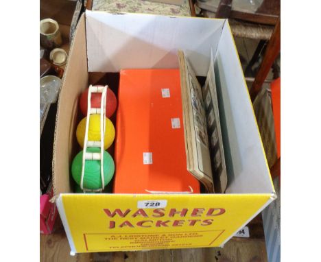 A shoebox containing a quantity of vintage badges, etc. - sold with child's boules set and a schoolboy stamp album