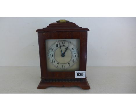 A platform escapement 8 day mantle clock with Arabic numerals to chapter ring