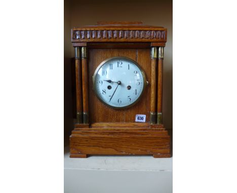 An oak case bracket clock, strikes hours/half with an 8 day movement