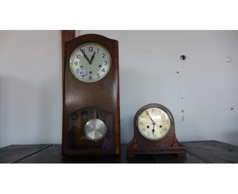 An Enfield chiming wall clock and an oak mantle clock