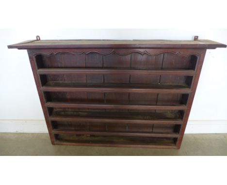 An antique Continental elm rack - Height 87cm x 124cm x shelf depth 12cm with lip