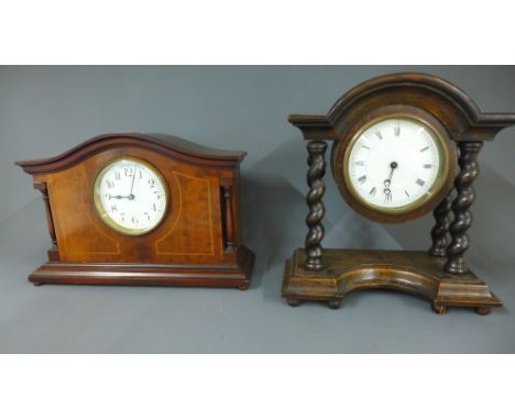 An oak mantle clock and an Edwardian mahogany and inlaid mantle clock