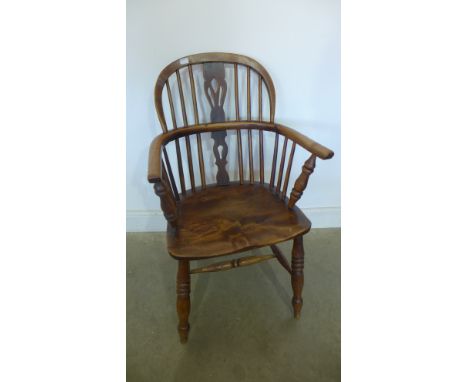 A 19th century ash and elm stick back Windsor armchair