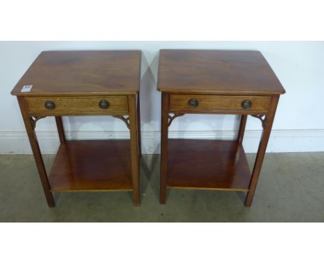 A pair of mahogany lamp tables with a single drawer