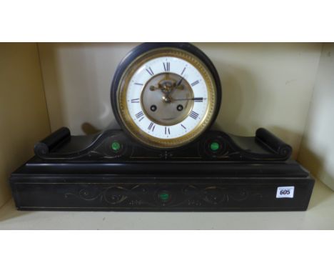A Victorian black slate drum striking mantle clock with exposed escapement - 30cm x 55cm - with pendulum and key