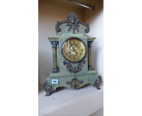 A French green onyx mantle clock