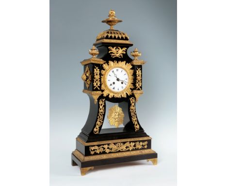 19th century table clock.Bronze, ebonised wood and porcelain dial.Measurements: 66 x 34 cm.Table clock made for the Turkish m