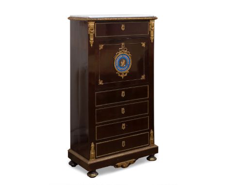 Bureau à batain; Napoleon III period, second half of the 19th century.Porcelain plate on paper and gilt bronze appliques.Keys