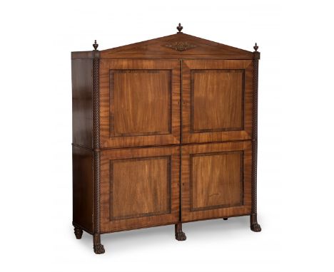 Cabinet; Germany, 1820.Mahogany wood with rosewood decoration and mahogany and brass columns.It retains keys and has removabl