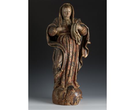 Spanish school, 17th century."Saint Veronica".In carved wood, gilded and polychrome.Lacks in the wood and the polychromy.Meas