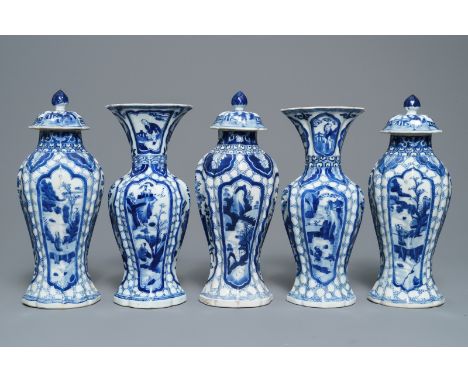 A Chinese blue and white five-piece garniture with figures in landscapes, Kangxi H.: 31 cm - H.: 28,5 cm&nbsp;---------Please