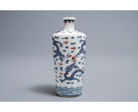 A Chinese blue, white and underglaze red 'dragon' vase, Kangxi mark, 19/20th C. H.: 11 cm ------ Please request condition rep