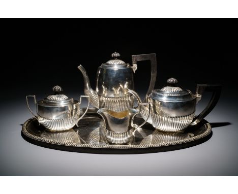 A silver tea service on tray, prob. Germany, late 19th C. Dimensions:H.: 19 cm (the coffee jug)H.: 13,5 cm (the teapot)H.: 11