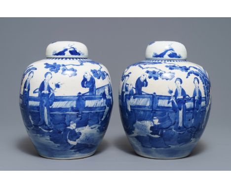 A pair of Chinese blue and white jars and covers with figures in a garden, Kangxi mark, 19th C. H.: 33 cm      ------        