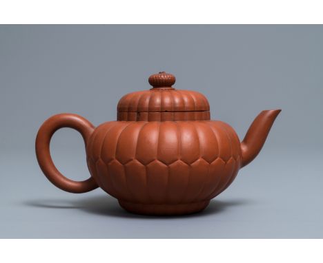 A Chinese Yixing stoneware 'chrysanthemum' teapot and cover, Kangxi H.: 11 cm – L.: 20 cm---------Please request condition re