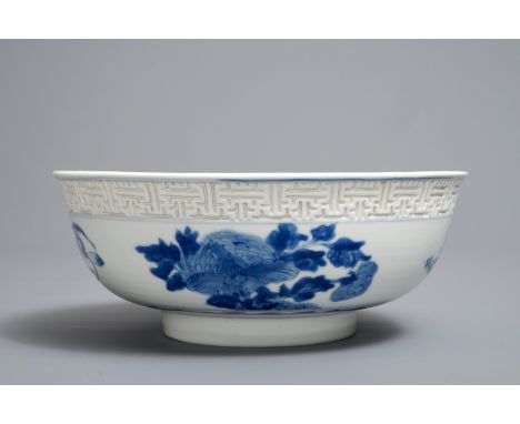 A Chinese blue and white 'mantou' bowl with carved key fret border, Kangxi H.: 7,5 cm - Dia.: 19 cm---------Please request co
