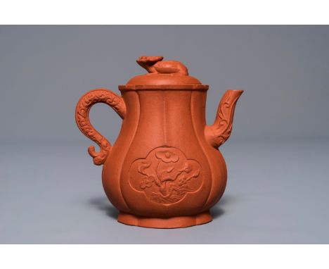 A Chinese Yixing stoneware wine jug with applied flowers and buffalo, Kangxi H.: 12 cm---------Please request condition repor