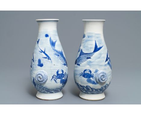 A pair of Chinese blue and white 'fish and crab' vases, Kangxi mark, 19th C. H.: 30 cm      ------        Please request cond