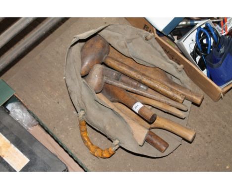 A bag of lead beating tools