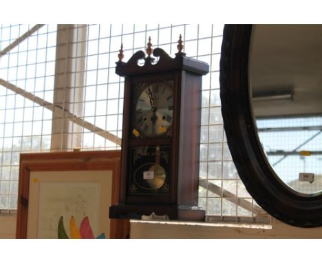 A Highlands two hole wall clock 