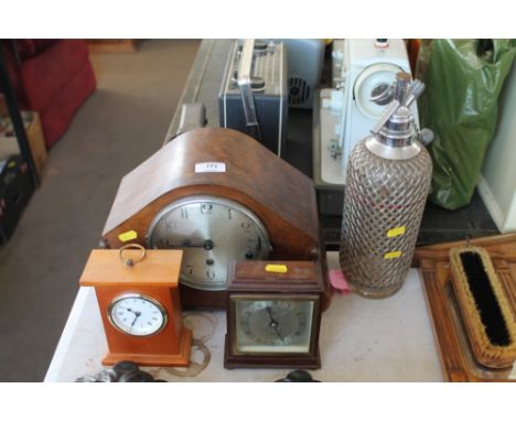 A three hole oak mentel clock and two other clocks 
