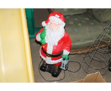 A light-up Father Christmas ornament 