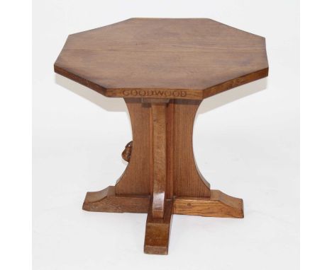 Robert 'Mouseman' Thompson - an oak octagonal low occasional table, the replacement top titled 'Iberia Goodwood 1954' to oute