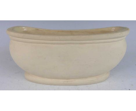 Constance Spry and Charles West for Fulham Pottery - an early 20th century flattened oval trough shaped mantel vase, cream ea