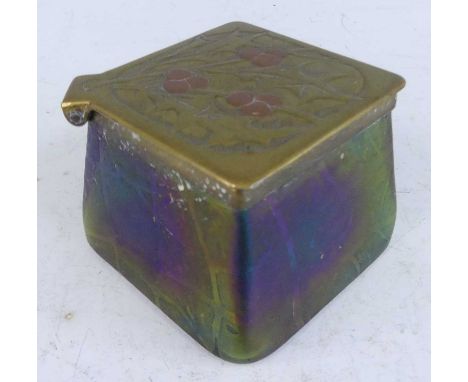 An Art Nouveau iridescent glass and brass inkwell by Kralik, of square slightly tapering form, the hinged cover with thistle 