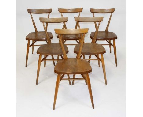 A set of six 1960s Ercol blond elm stacking school chairs, each with single barback, turned supports and slightly dished seat