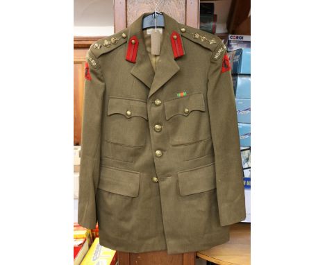 British army uniform, a khaki green jacket with Hawkes &amp; Co Ltd of London label penned '236 G H LEWIS 21/7/43' having epa